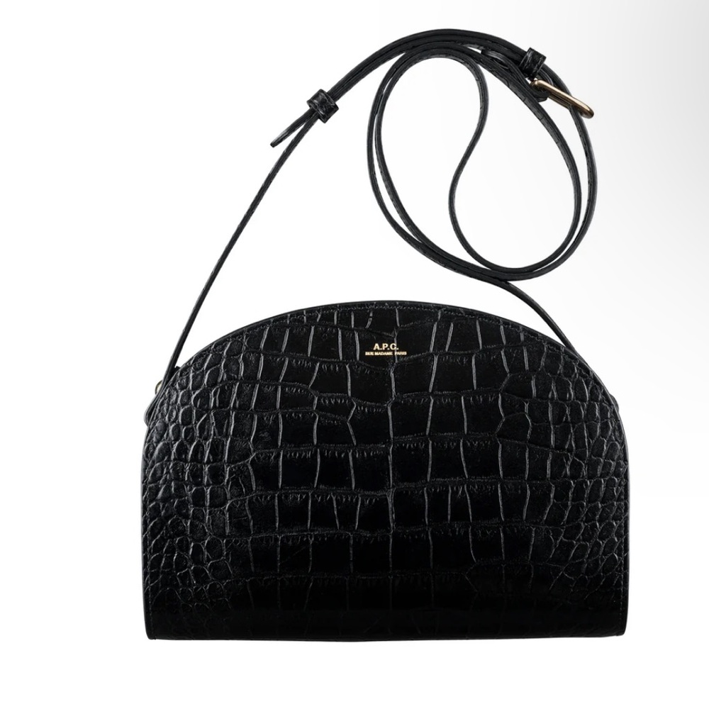 APC Demi-Lune bag in black leather embossed with a crocodile motif.